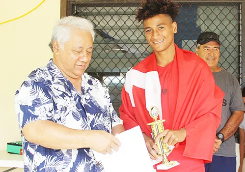 Petu Pouli of Vaiala Tongan’s Boys 13-15 team receives his MVP award