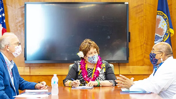 Amata with VA doctors and personnelDirector Sergio S. Chao of the Honolulu Regional Office and VA Clinic Director Dr. Adam Robinson