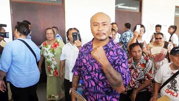 Talalelei Pauga and supporters outside court in Apia