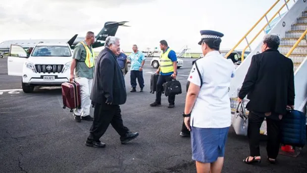 Tuilaepa Dr. Sa'ilele Malielegaoi boards Samoa Airway's inaugural flight to Brisbane