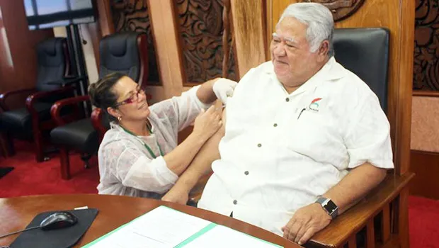  Samoa's Prime Minister Tuilaepa Sailele Malielegaoi receives his measles vaccination.