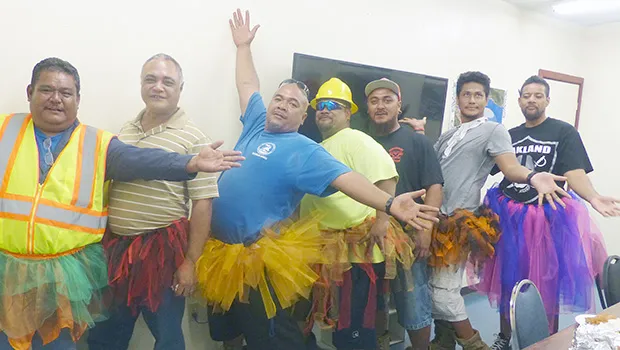 Male Port Admin employees decked out in Halloween "tutus"