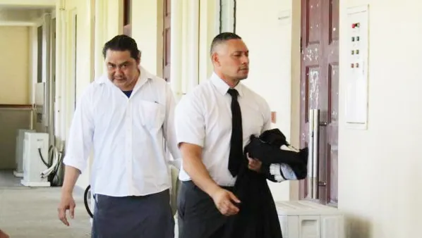 Kolani Junior Lam with his attorne