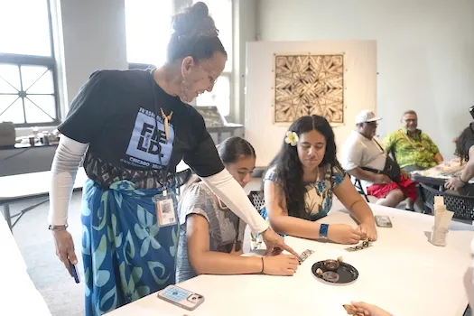 Reggie with students