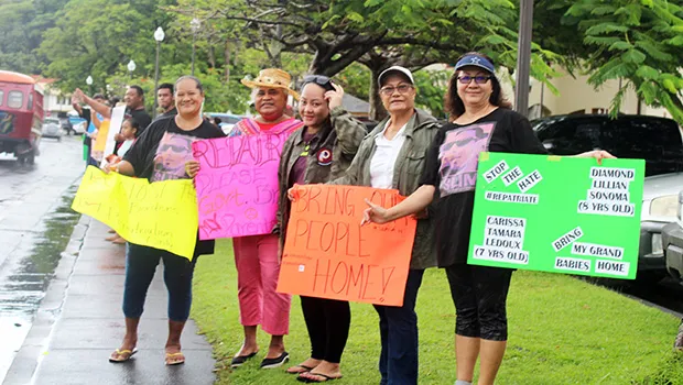Ladies who were among residents who participated in the  “Wave for repatriation flights - Not open borders” 