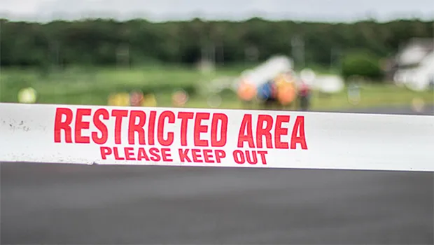 Police tape sealing off the area at the Mulifanua wharf,