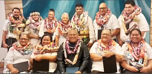 Pastor John Alailima (seated middle) and the 11 graduates 