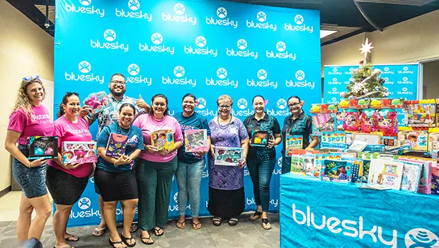 Rotaract members with donated toys