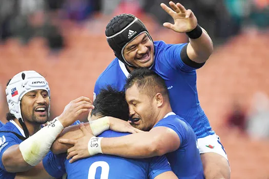 Samoa celebrates a try against Tonga.