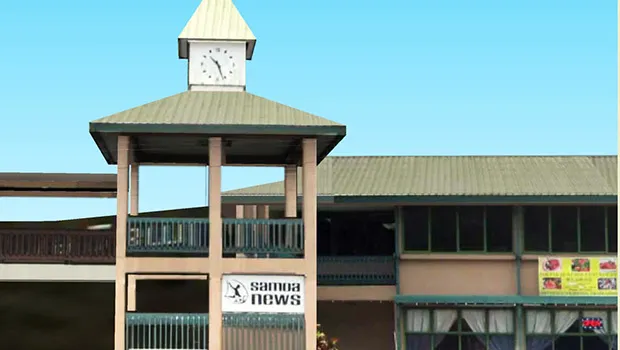 Samoa News clock tower and sign.