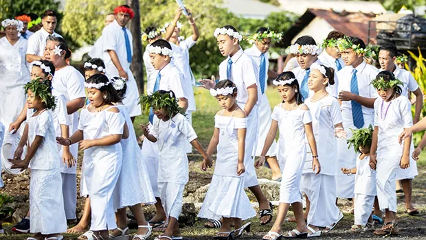 Children parading to White Sunday celebration in Samoa