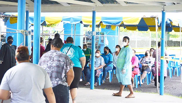 Parents picking up food coupons at Samoana H.S.