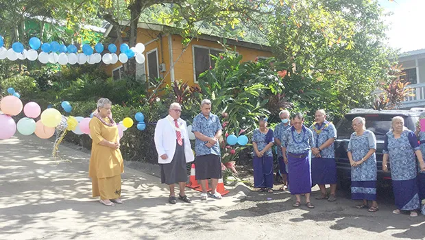 First Lady Cynthia Malala Moliga (left), along with Pastor Willie Solofa and others