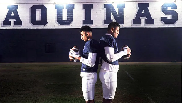 Aquinas High School football players Francisco Mauigoa, 16, (L), and Francis Mauigoa, 14, (R)