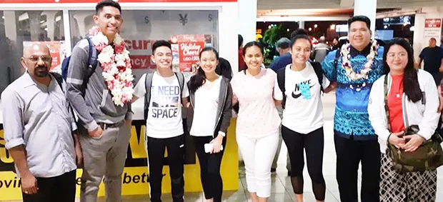 The six local students - pictured with their chaperones