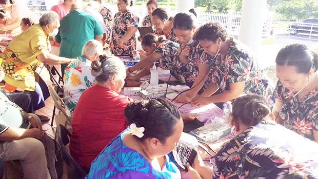 Senior Citizens getting a blood pressure check