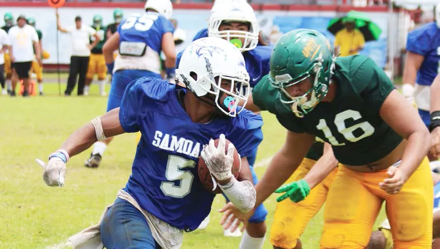 Samoana Sharks Marcus Samia storming down field 