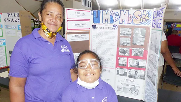 Semo Afalava with his science fair project