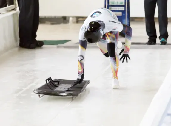 Skeleton racer mounting sled