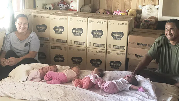 Mrs. Filomena Sokimi (far left) and Sokimi Sokimi Jr. (far right) of Ili’ili with the four baby girls