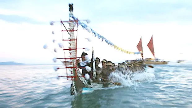 A traditional war canoe, Tomoko, from Roviana in the Western Solomons participates in the Pacific flotilla at the opening of the 11th Festival of Pacific Arts in Honiara. June 2012.  American Samoa hosted in 2008 and Hawaiʻi will be hosting in 2020. 