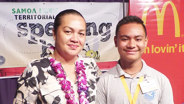 2019 Samoa News Spelling Bee winner, MaoZache Taufete'e with McDonald's American Samoa official, Carol Tautolo Samuelu