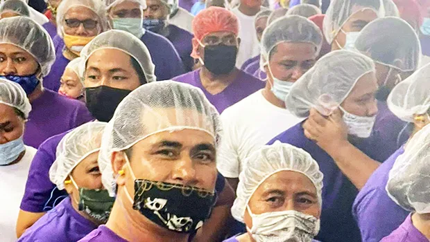 StarKist workers wearing purple