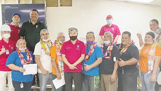 some of their recipients with their supervisors and managers, led by General Manager Jason Kim