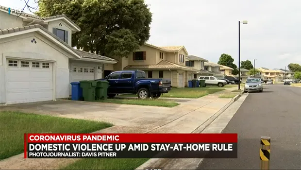 A neighborhood with cars in the driveways