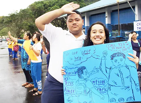 students with sign
