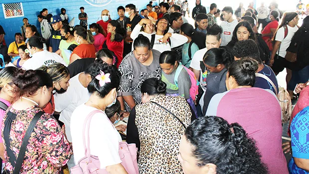 Students and parents at summer school registration