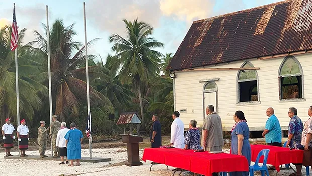 Swains Island flag raising