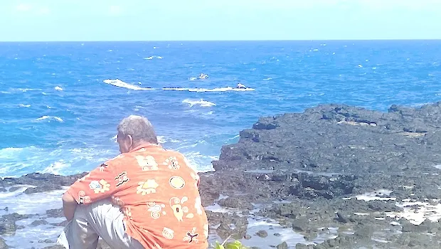 Man watches search at sea