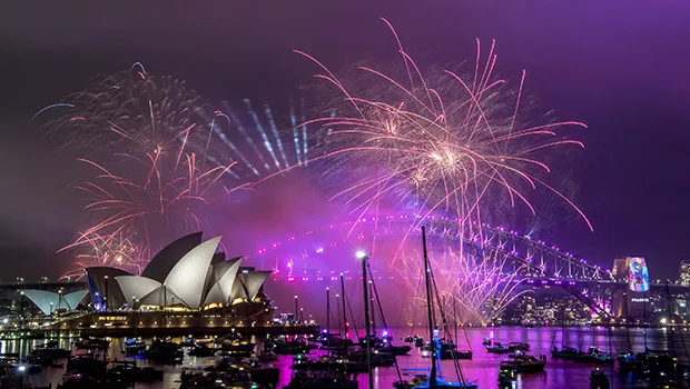 Fireworks explode over the Sydney Harbour