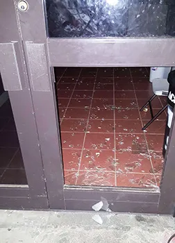 Broken door where break-in occurred