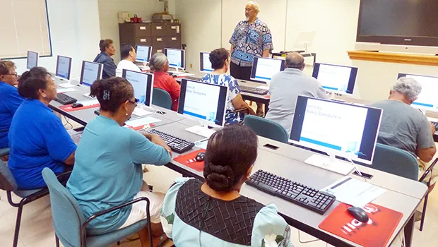 Computer instructor, Loring Fa'iivae (front-standing) of the Feleti Barstow Public Library on Tuesday during the start of the basic computer skills taught class for seniors