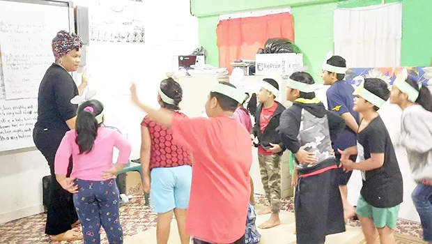 Ms. Faaletaua Saili and Lupelele Elementary students