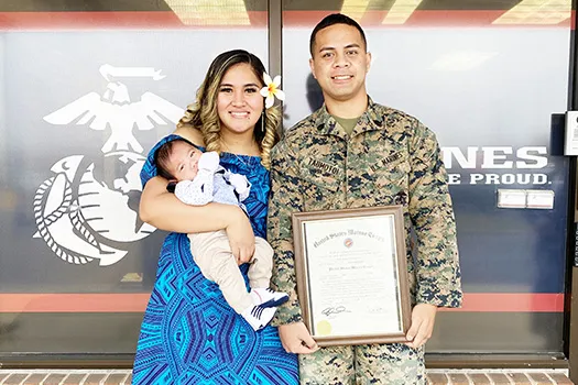 SSGT Taumotoi is pictured here with his wife Ejay Schuster, and son, Giannis Benjamin Taumotoi