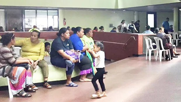 People waiting to be called for their turn at the Tax Office