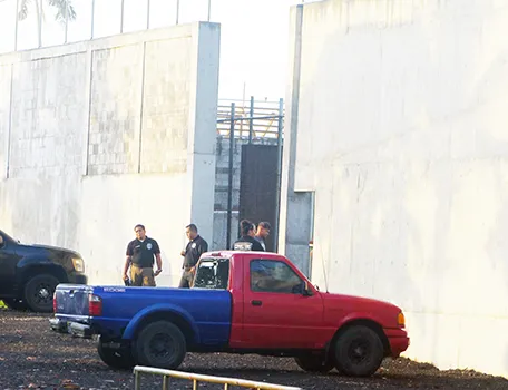 TCF guards changing shifts outside wall