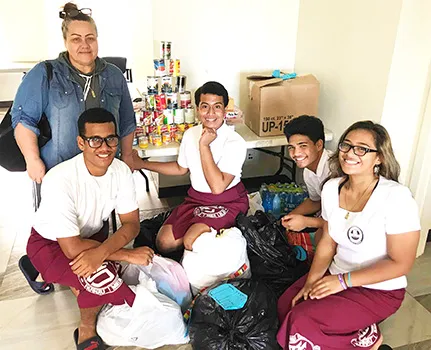 Members of Tafuna High School Class of 2022 with donations