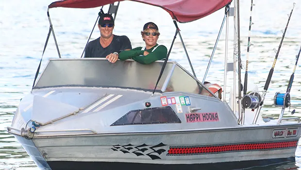 Tisa and Candyman aboard his fishing boat.