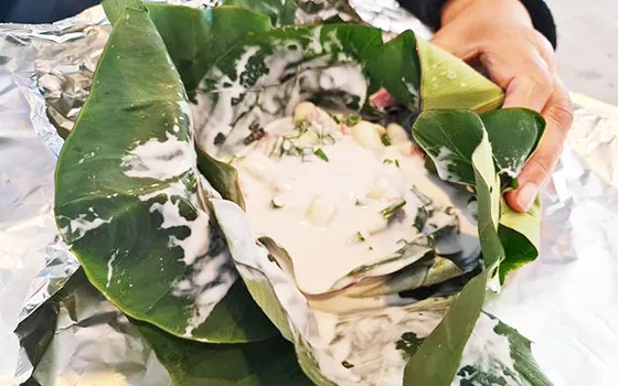 Tongan Lu involves taro leave, onions, meat and coconut cream 