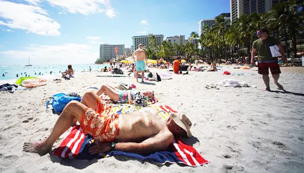 Tourists on Waikiki Beach