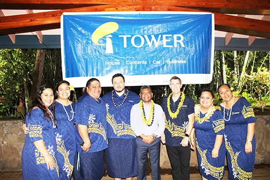 Turnball is pictured with the Tower staff during