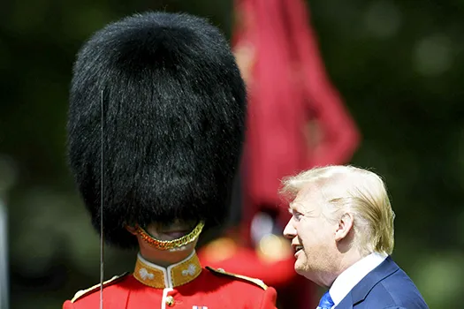 U.S. President Donald Trump inspects an honor guard 