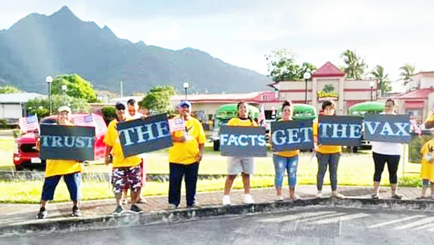 "Trust the Facts, Get the Vax" wave in Tafuna
