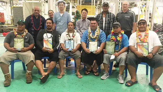 (Seated, l-r): Faamavaega Tanielu (10 years of service), Joseph Fale (5 years of service), Feai Taele (15 years of service), Desmond Petaia (10 years of service), Pio Vito Jr. (10 years of service) and Paul Tui (5 years of service).   (Standing l-r): Shift Supervisor Iakopo Ioane, Inventory Specialist Lusia Luaifoa, Chief Financial Officer Eogyoon Kim, Plant Manager Choelyour Lim, Shift Supervisor Iopu Mara, Electrical Supervisor Graeme Dunstan.