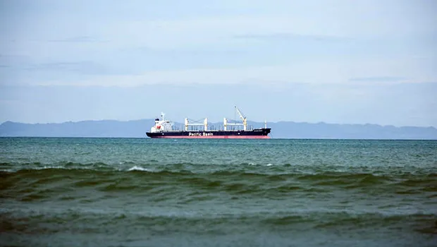 A transshipment vessel off shore of a Pacific island