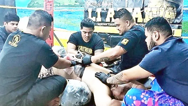 David Tua getting traditional Samoan pe'a in boxing ring